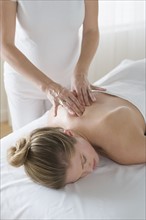 Woman receiving massage. Photo : Rob Lewine