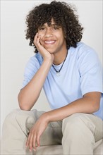 Portrait of teenage boy (14-15). Photo : Rob Lewine