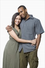 Studio portrait of young couple. Photo : Rob Lewine