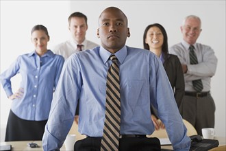 Portrait of business people in office. Photo : Rob Lewine