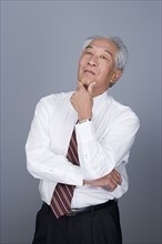 Portrait of senior businessman. Photo : Rob Lewine