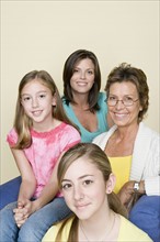 Portrait of three generation family with two girls (8-9, 14-15). Photo : Rob Lewine