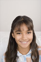 Portrait of smiling girl (10-11) . Photo: Rob Lewine
