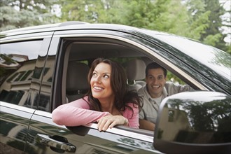 USA, New Jersey, Couple in car. Photo : Tetra Images