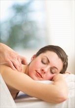 Woman receiving massage.