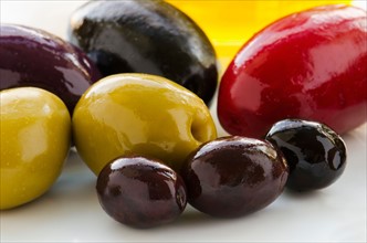 Close-up of various olives, studio shot.