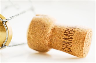 Close-up of champagne cork, studio shot.