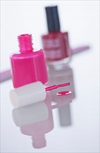 Studio shot of pink nail polish. Photo : Daniel Grill