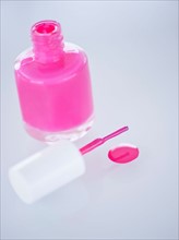 Studio shot of pink nail polish. Photo : Daniel Grill