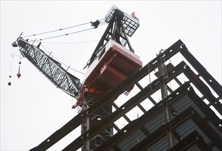 part of construction frame and crane. Photo : fotog