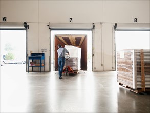 Man working in warehouse.
