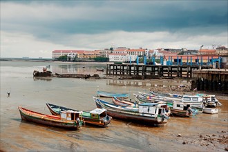 Panama, Panama City, Fishing boats on coastline at low tide. Photo : DreamPictures