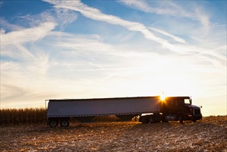USA, Iowa, Latimer, Truck on harvested field . Photo : Sarah M. Golonka