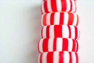 Red and white candies, studio shot. Photo : Sarah M. Golonka
