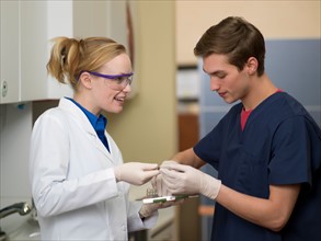 Dentists in dental surgery. Photo : Dan Bannister