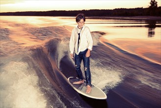 Boy wakeboarding on Lake Greeson. Photo : King Lawrence