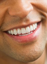 Close-up of man's perfect teeth.