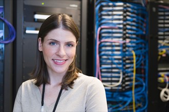 Portrait of female IT support technician.