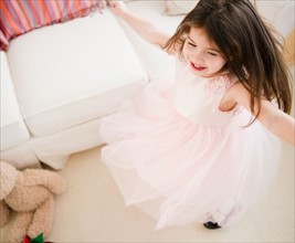 Small girl  (4-5 years) dancing in tulle dress. Photo : Jamie Grill