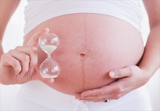 Pregnant woman with ultrasonography scan. Photo : Daniel Grill