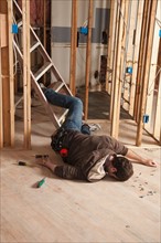 Handyman falling of ladder. Photo : DreamPictures