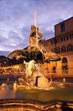 Italy, Rome. Piazza Barberini, Fountain of the Triton in early morning. Photo : Henryk Sadura