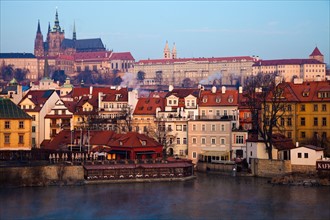 Czech Republic, Prague. View over Vltava River towards Prague Castle in early morning. Photo :