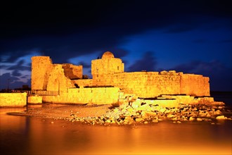 Lebanon, Sidon. Sidon Sea Castle at dusk. Photo : Henryk Sadura