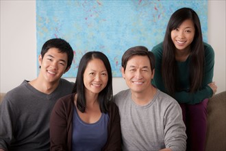 Portrait of smiling family. Photo : Rob Lewine