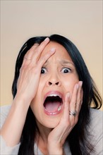 Portrait of screaming woman. Photo : Rob Lewine