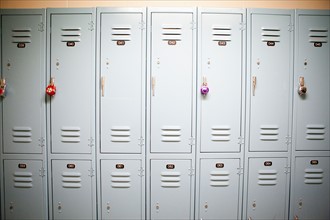 Row of lockers with different padlocks. Photo : Jessica Peterson