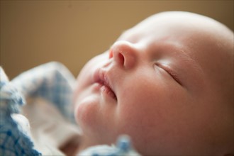 Portrait of sleeping baby boy (2-5 months). Photo : Jessica Peterson