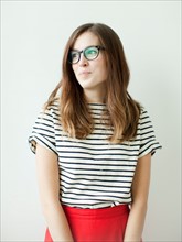 Studio shot of young woman. Photo : Jessica Peterson