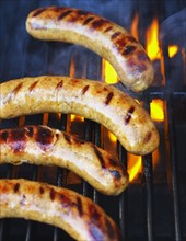 Sausages on bbq.