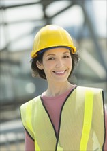 Portrait of female construction worker.