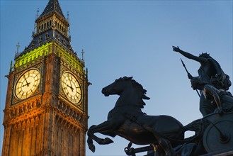 UK, England, London, Big Ben and Boadicea Statue at dusk.