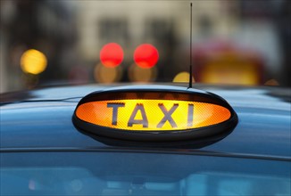 UK, England, London, Sign on taxi cab.