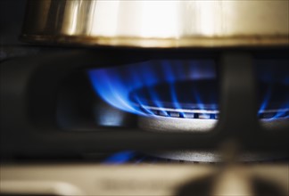Close-up of gas stove burner. 
Photo : Jamie Grill
