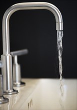 Water flowing from faucet. 
Photo : Jamie Grill