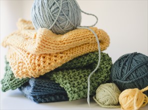 Knitted blankets and balls of yarn. 
Photo : Jamie Grill