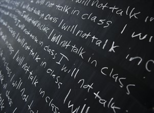 Blackboard with writing lines. 
Photo : Jamie Grill