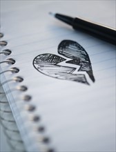 Drawing depicting broken heart. 
Photo : Jamie Grill