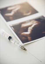 Sonogram and syringe. 
Photo : Jamie Grill