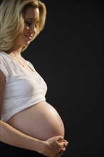 Portrait of pregnant woman. 
Photo : Jamie Grill