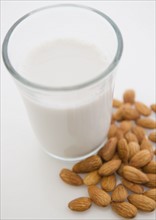 Close up of almond milk and almonds. 
Photo: Jamie Grill
