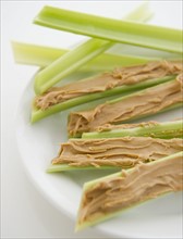 Close up of stems with almond butter . 
Photo: Jamie Grill