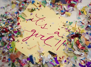 Close up of greeting card with confetti. 
Photo : Jamie Grill