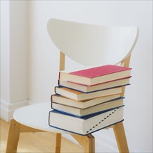 Close up of book on a chair, studio shot. 
Photo : Daniel Grill