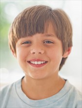 Portrait of smiling boy (10-11 years) . 
Photo : Daniel Grill