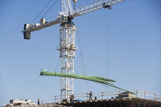 Crane on construction site. 
Photo : fotog